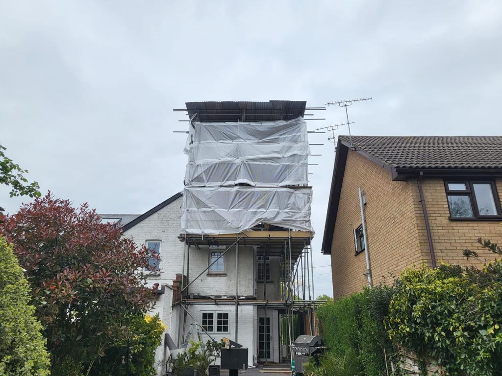 Tin roof cover, Woking, Surrey